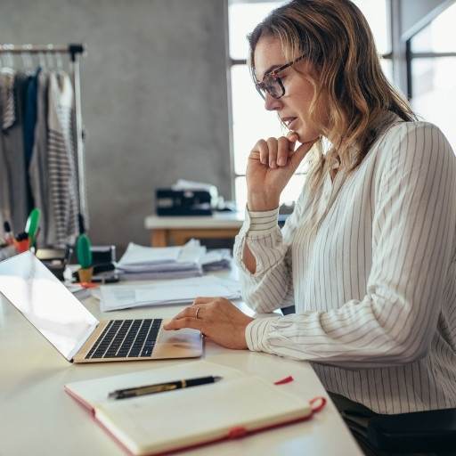 A businesswoman using her laptop
